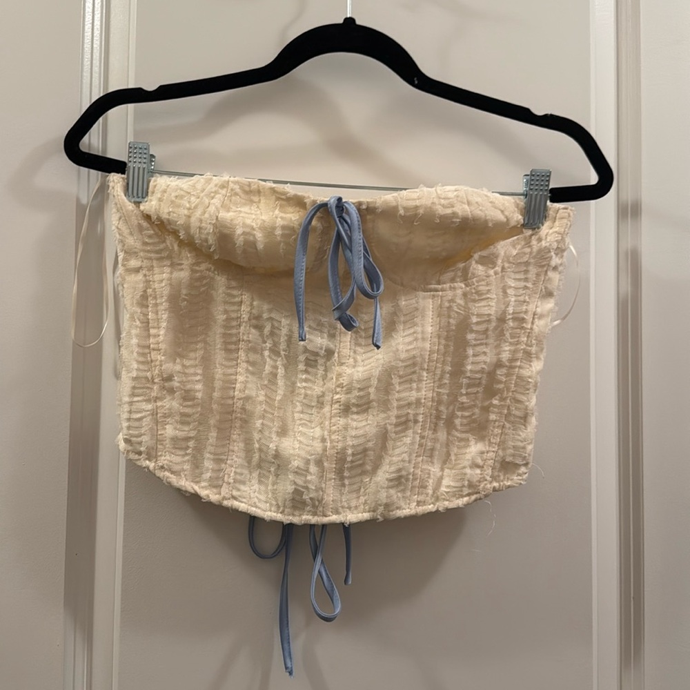 Pretty Garbage beige two top with blue string tie back